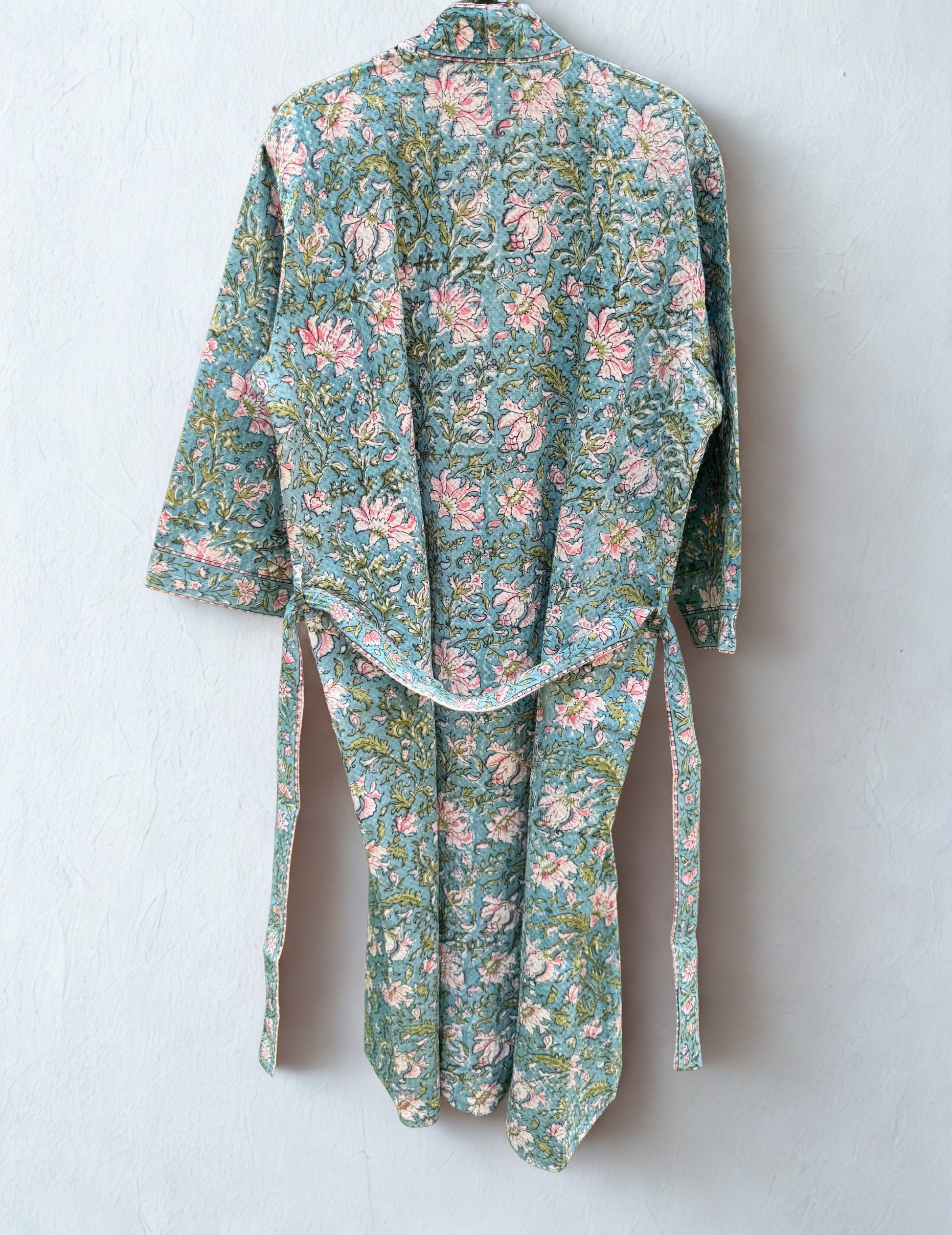 House of Mulmul - Blockprinted Cotton Bathrobe. Floral patterned robe on a white background