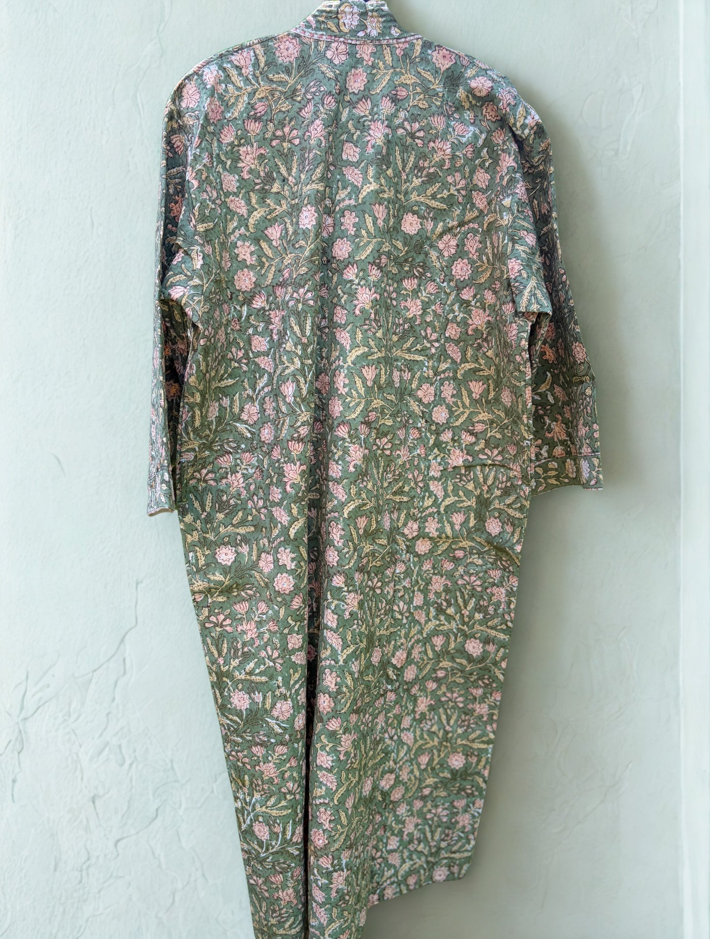 House of Mulmul - Blockprinted Cotton Bathrobe. Floral patterned robe on a light blue background