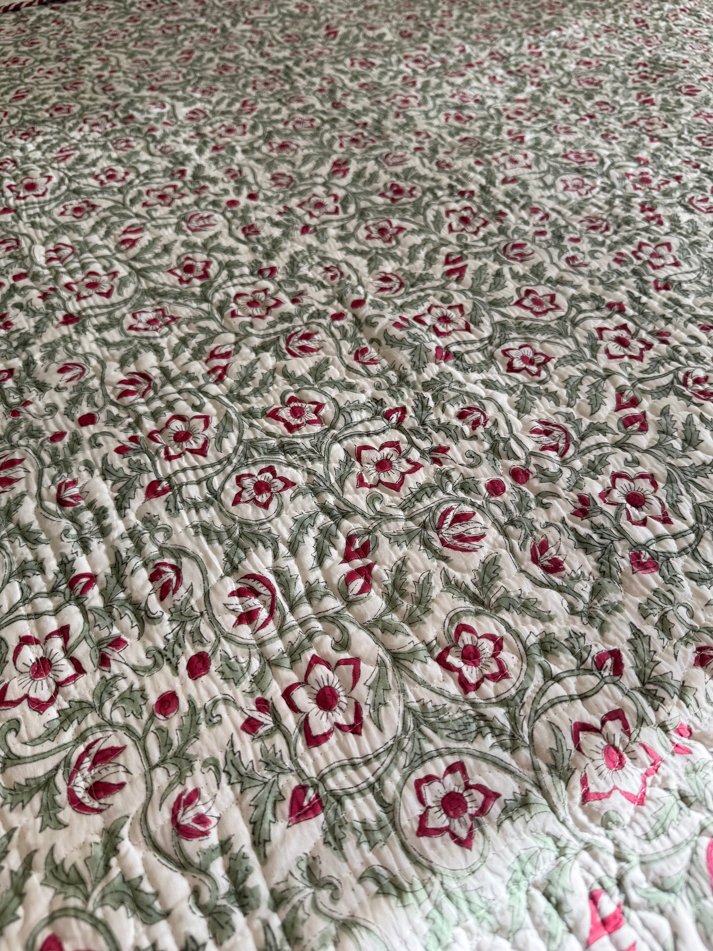 House of Mulmul - Blockprinted Cotton Bedcover Reversible Muslin. Floral patterned cotton bedcover bedspread with red and green design.