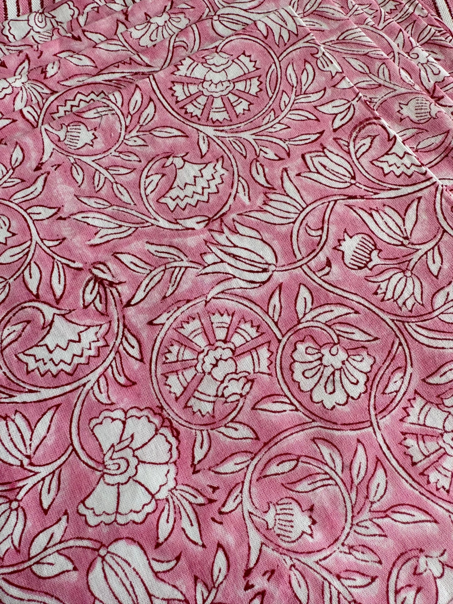 House of Mulmul - Blockprinted Cotton Mats and Napkins. Pink napkins with white floral and leaf patterns