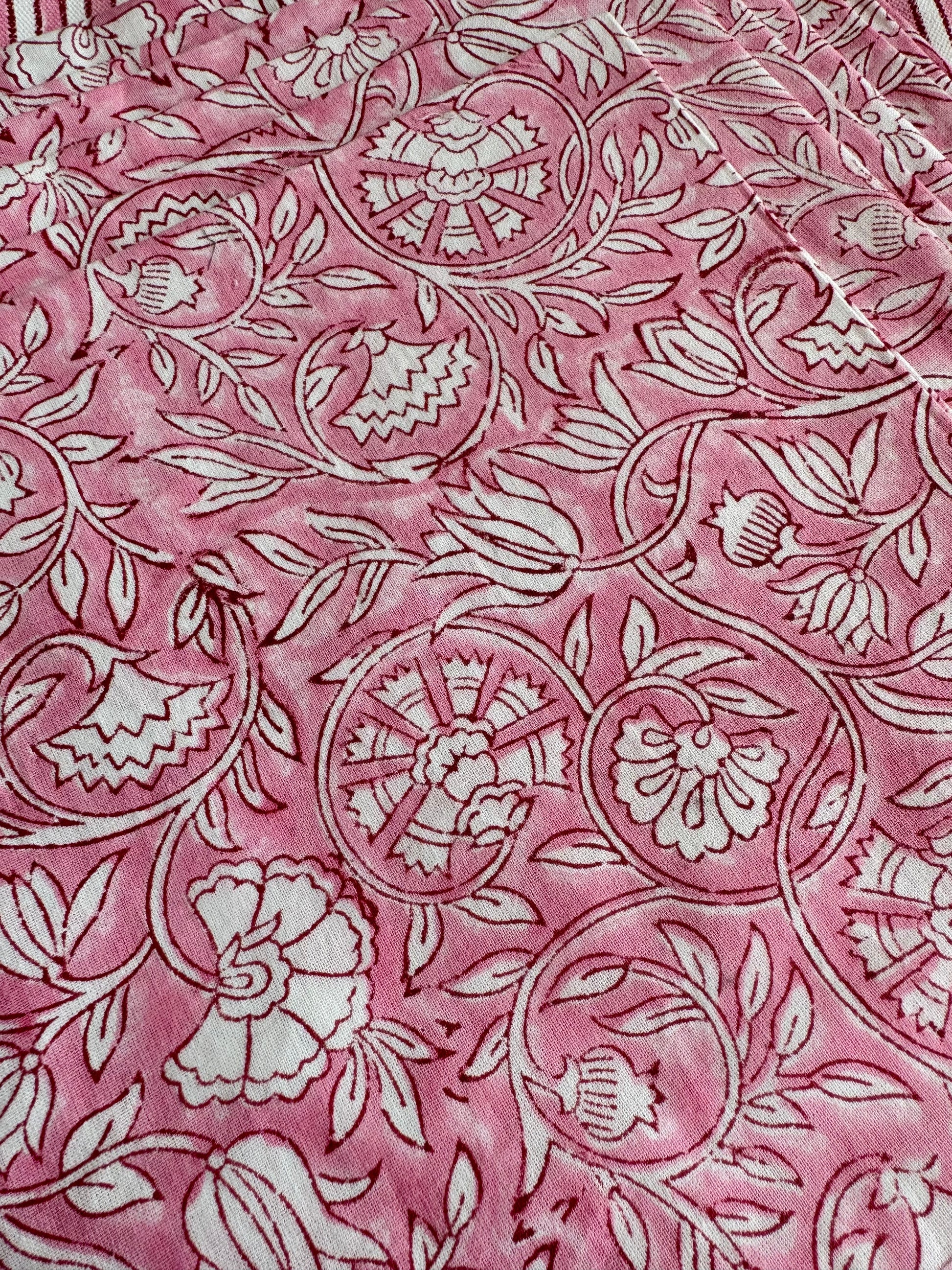House of Mulmul - Blockprinted Cotton Mats and Napkins. Pink napkins with white floral and leaf patterns