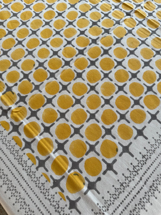 House of Mulmul - Blockprinted Cotton Table Cloth. Patterned tablecloth with yellow and gray design on a white background