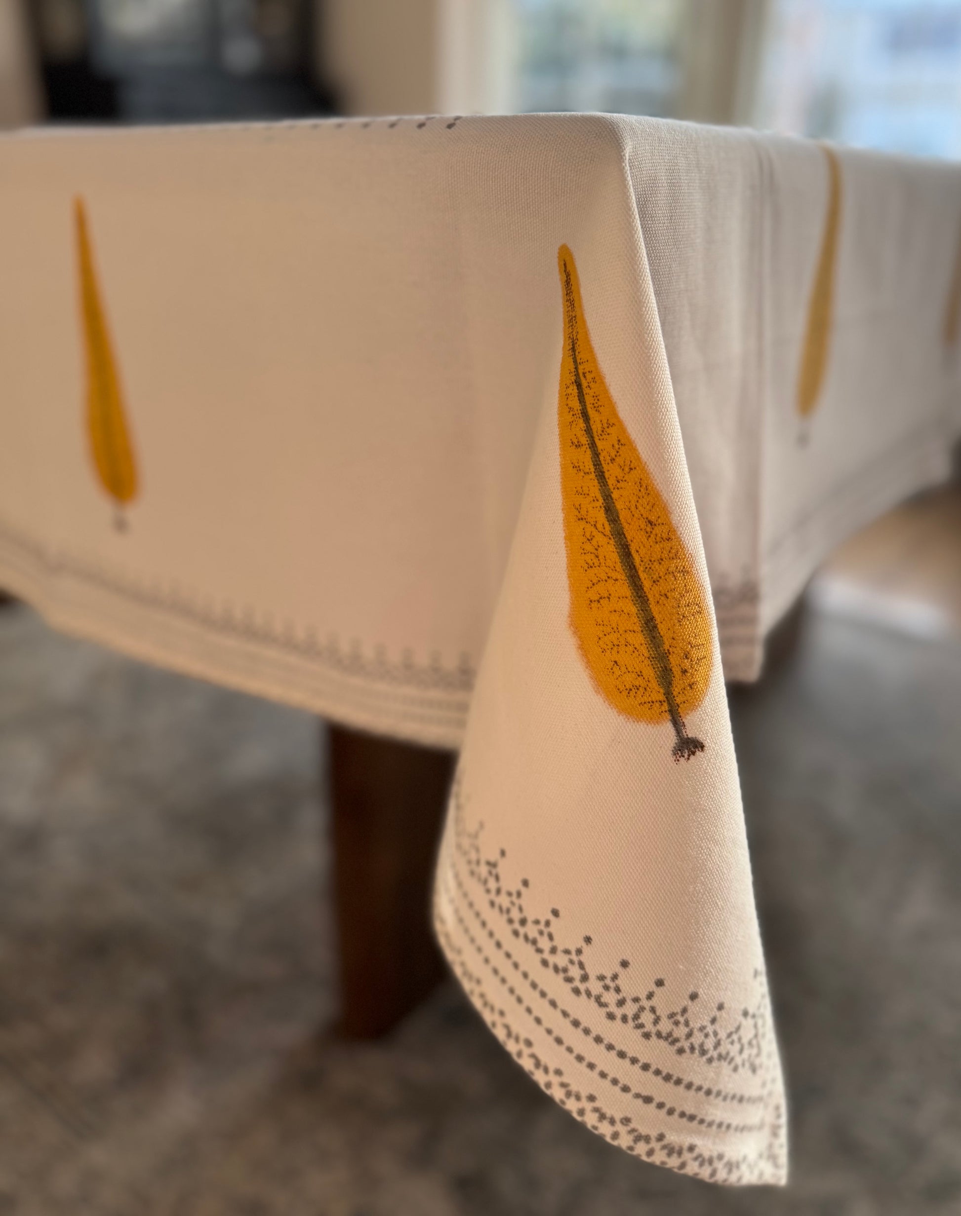 House of Mulmul - Blockprinted Cotton Table Cloth. Tablecloth with leaf design on a table