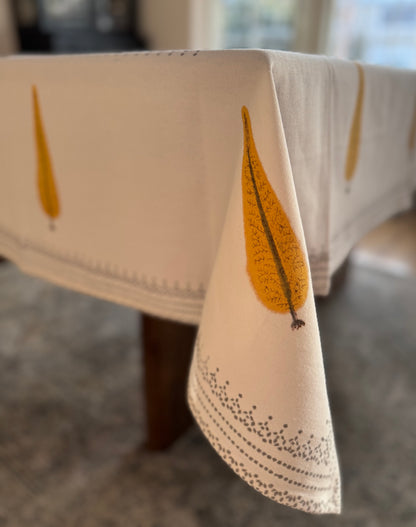 House of Mulmul - Blockprinted Cotton Table Cloth. Tablecloth with leaf design on a table