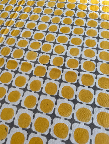 House of Mulmul - Blockprinted Cotton Table Cloth. Patterned table cover with yellow and gray circles on a white background