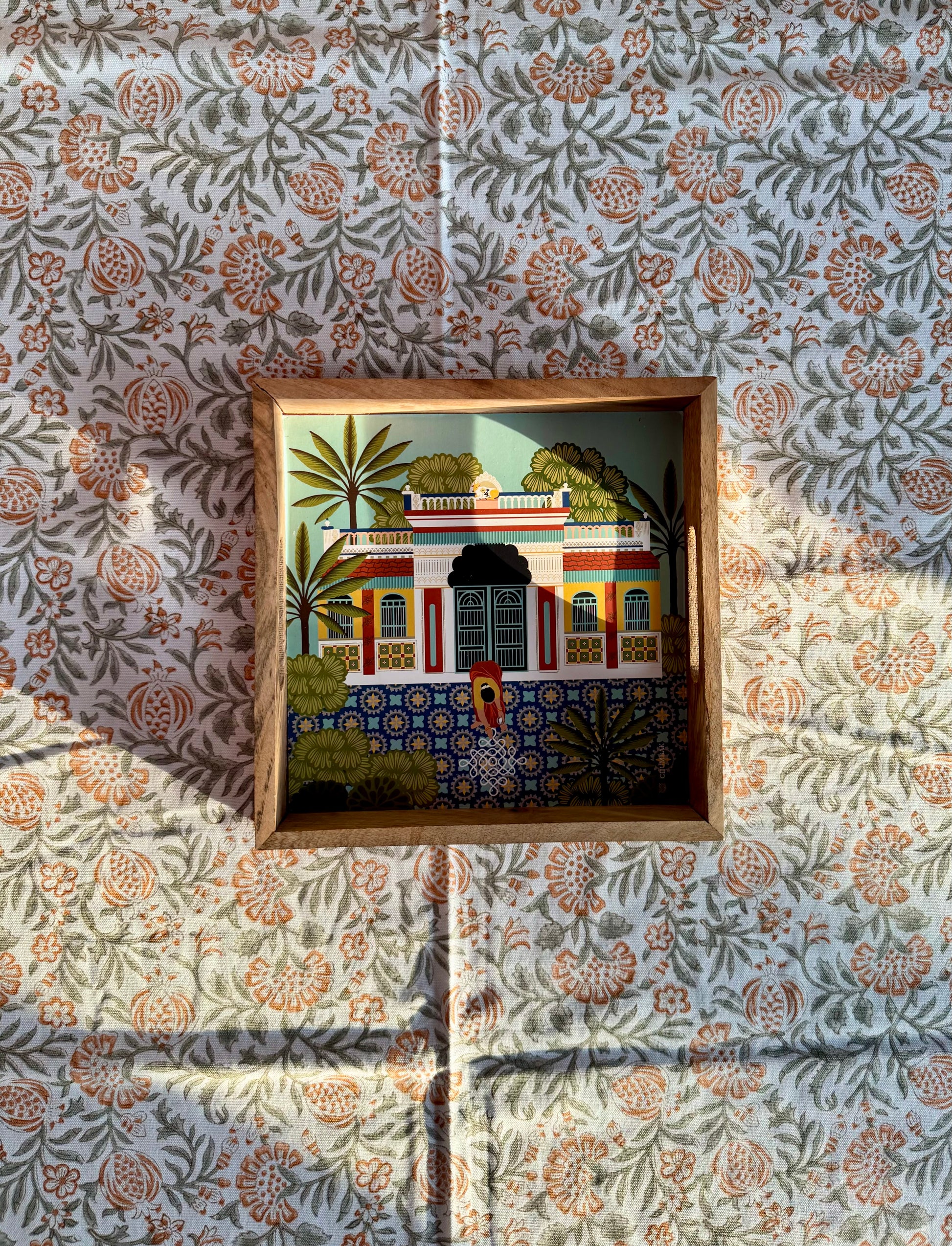 House of Mulmul - Blockprinted Cotton Table Cloth. Cotton table cover with a wooden tray and orange pomegranate design.