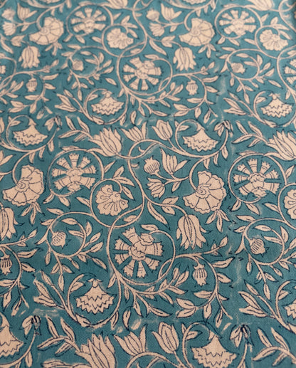 House of Mulmul - Blockprinted Cotton Table Cloth. Floral patterned fabric with beige flowers on a teal background