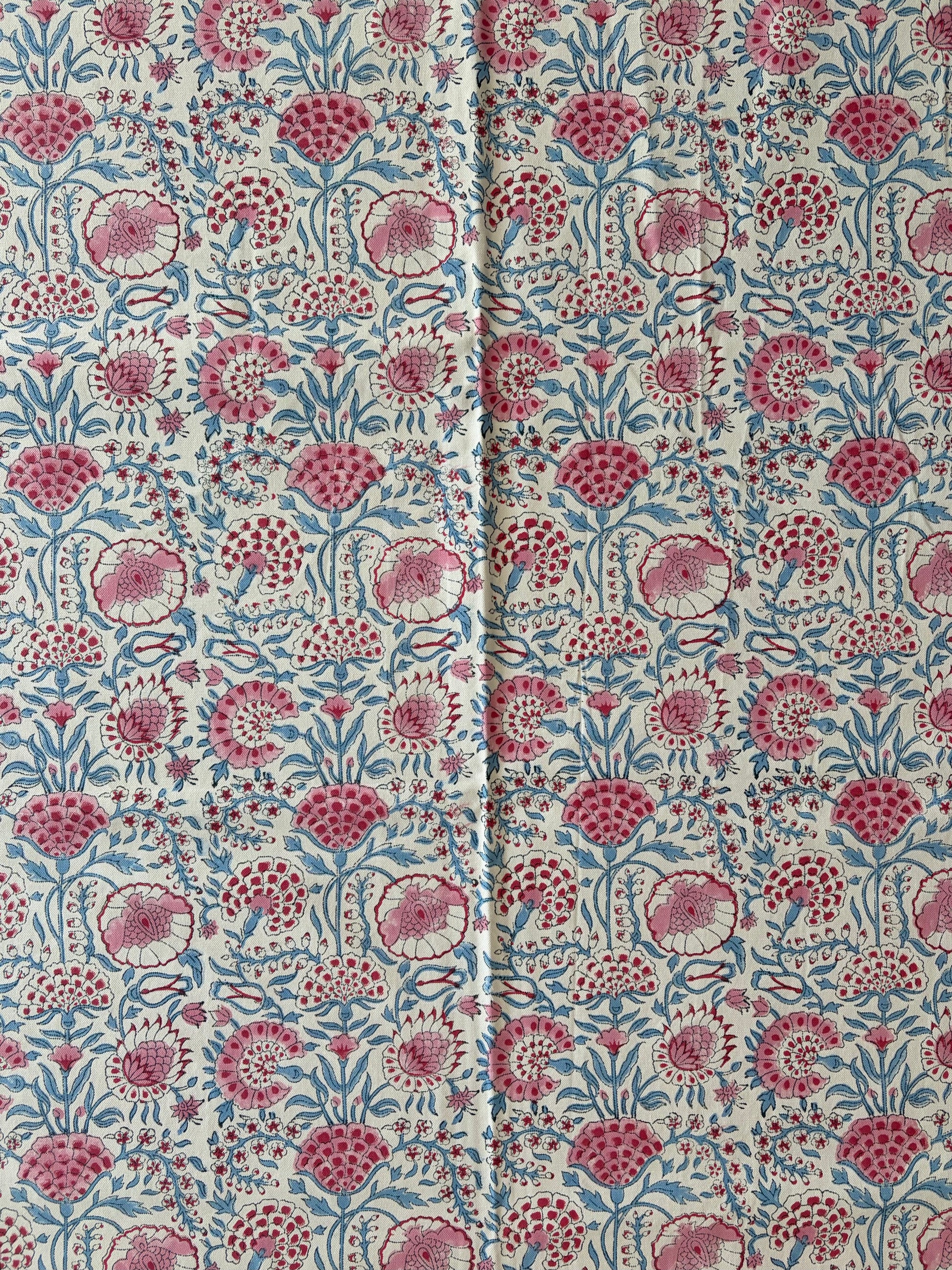 House of Mulmul - Blockprinted Cotton Table Cloth. Floral patterned fabric with pink and blue flowers on a white background