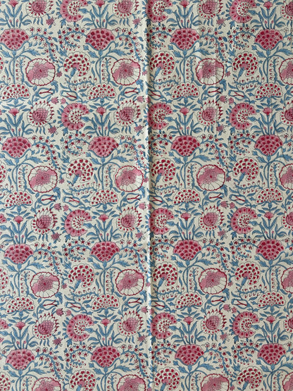 House of Mulmul - Blockprinted Cotton Table Cloth. Floral patterned fabric with pink and blue flowers on a white background