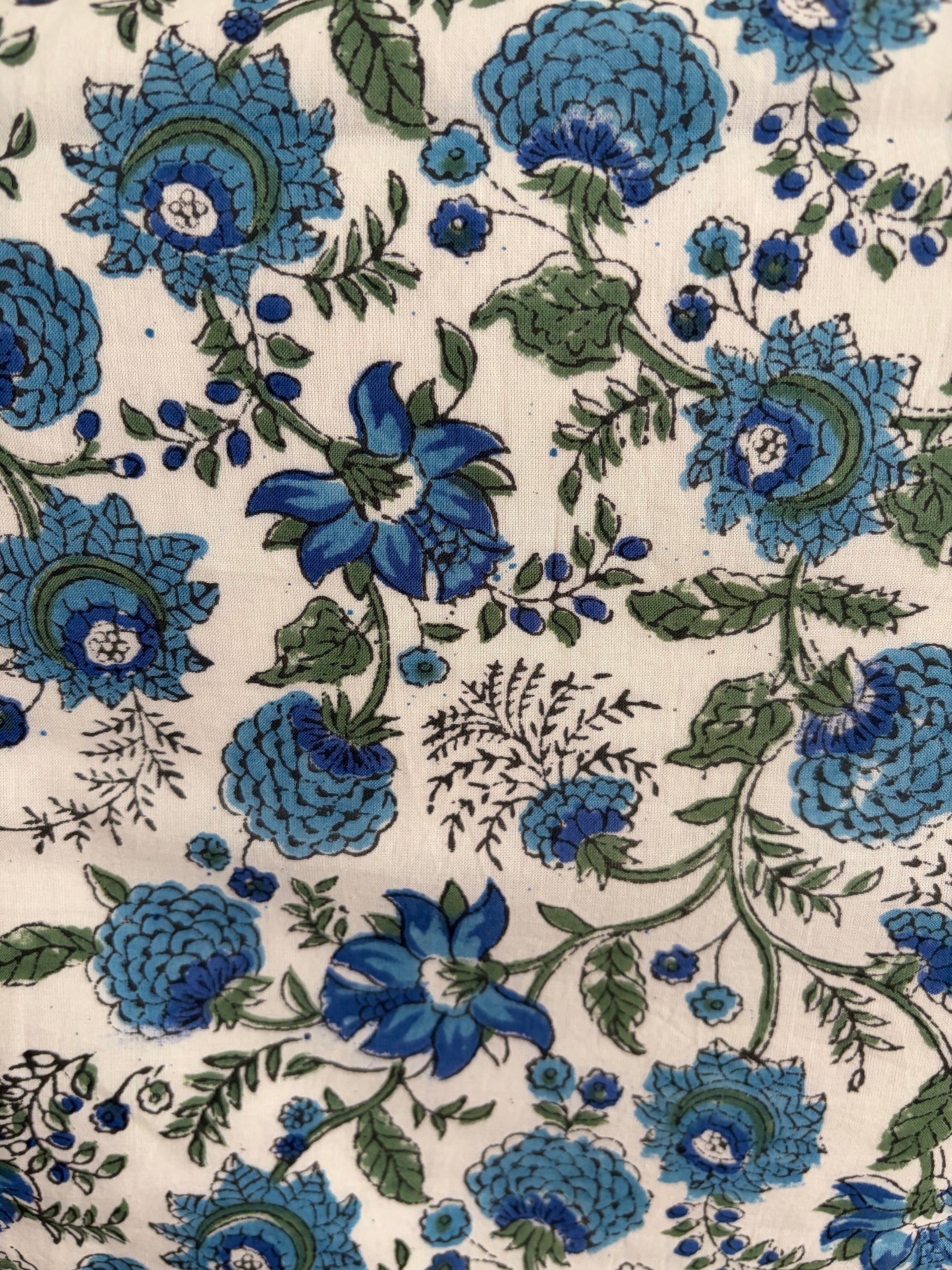 House of Mulmul - Blockprinted Cotton Reversible Table Runner & Placemats set. Close-up of blue floral pattern on a beige background