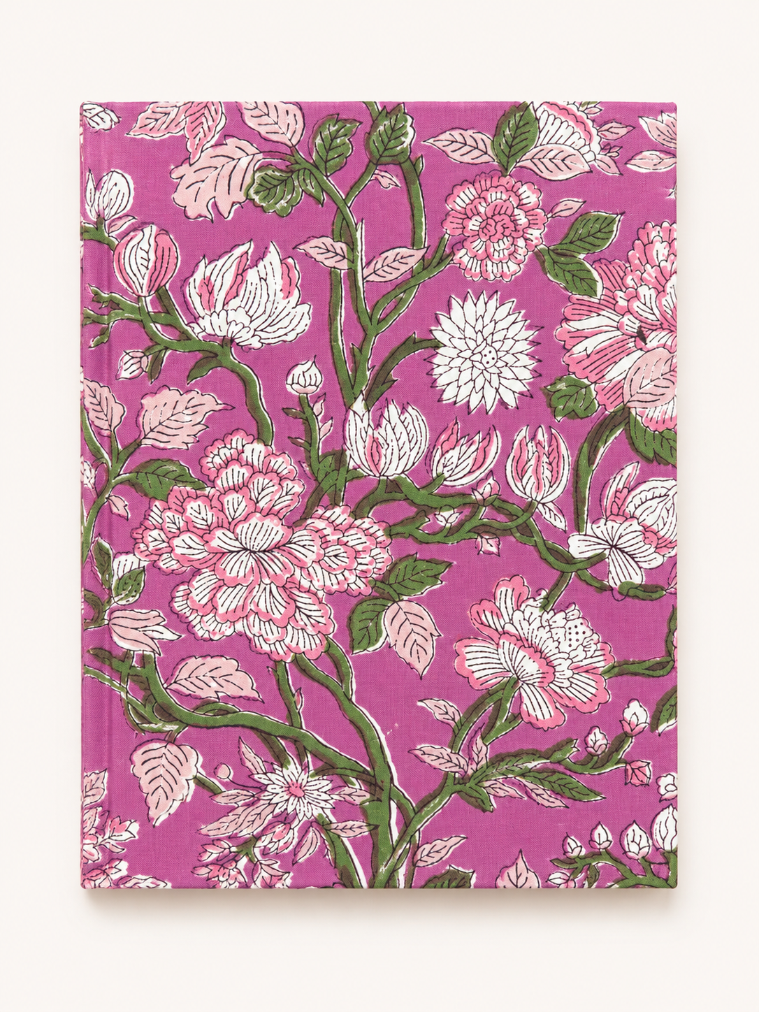 House of Mulmul - Blockprinted Journal Diary Notebook. A hardcover notebook with a vibrant magenta floral pattern featuring pink, white, and green blossoms and leaves, displayed flat against a light cream background.