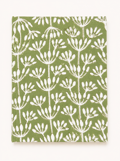 House of Mulmul - Blockprinted Journal Diary Notebook. A rectangular notebook or journal with a sage green cover featuring a white botanical block print pattern, shown against a plain off-white background.