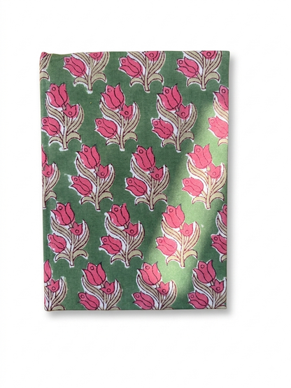 House of Mulmul - Blockprinted Journal Diary Notebook. A rectangular notebook featuring a repeating block-print style pattern of pink tulips with beige and white outlines, displayed flat against a white background.