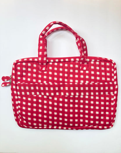 House of Mulmul - Blockprinted Cotton Quilted Laptop Bag. A red and white gingham patterned fabric tote bag with two top handles and a front zippered pocket, shown against a plain white background.