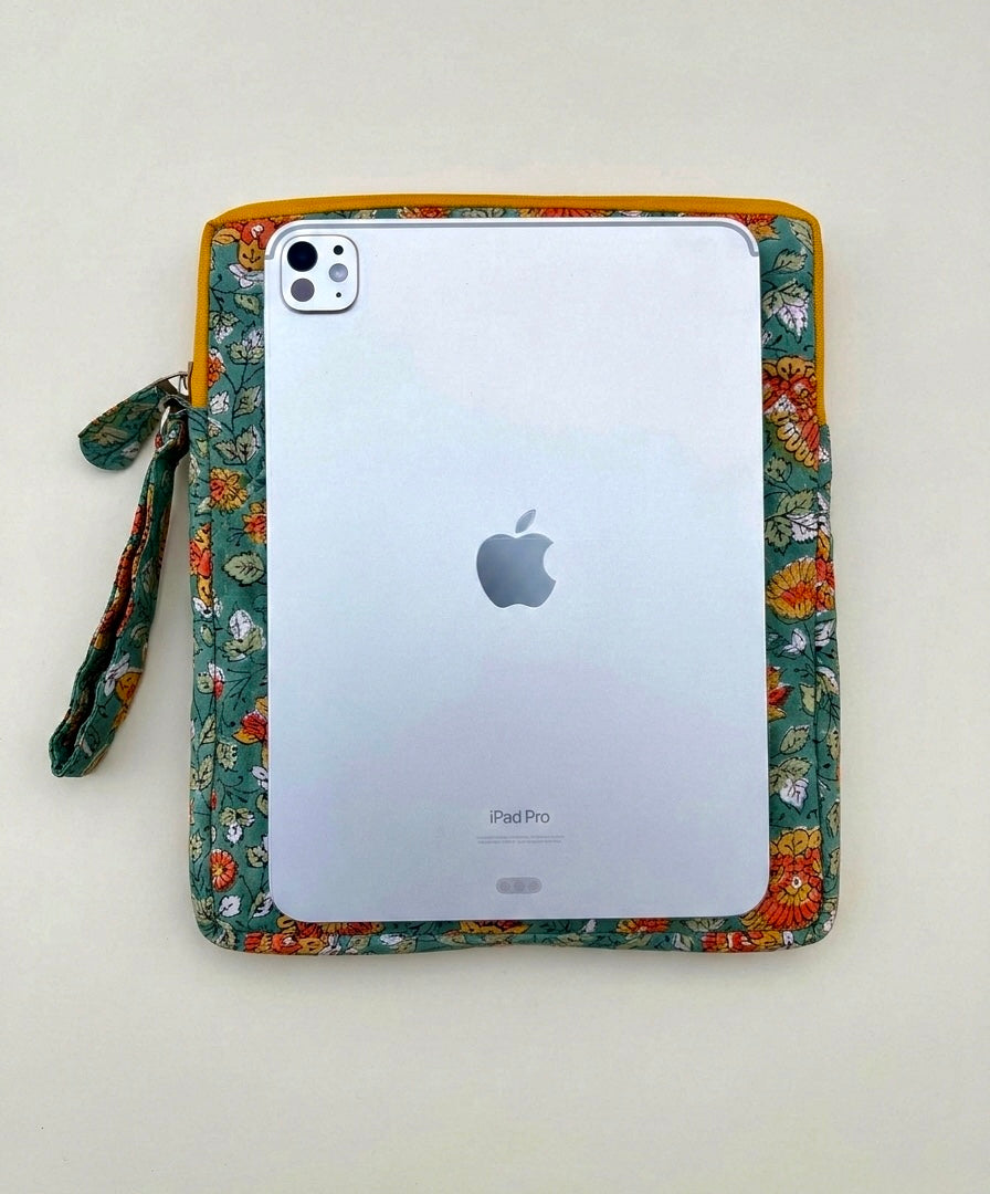 House of Mulmul - Blockprinted iPad Sleeve Cover. Floral patterned iPad sleeve cover with Apple iPad Pro on a white background