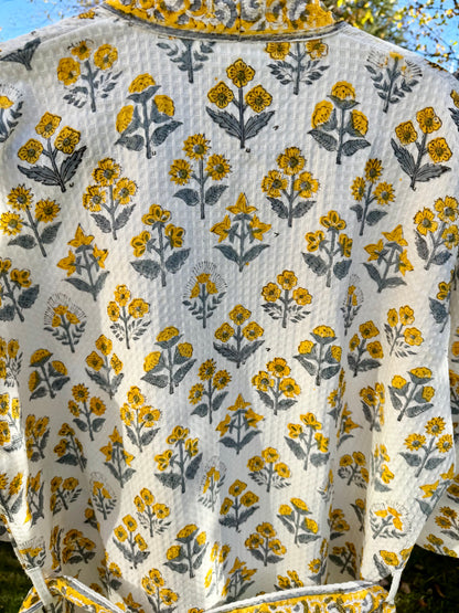House of Mulmul - Cotton Bath robe. Floral patterned robe with yellow and gray flowers on a white background