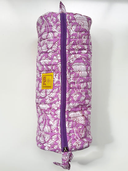 House of Mulmul - Cotton Quilted Makeup-Pencil Pouch. A purple and white floral patterned quilted travel pillow with a purple zipper and a small yellow brand label, shown against a plain white background.