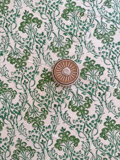 House of Mulmul - Cotton Table Cloth Round. Decorative green floral pattern on a white background with a central circular design.