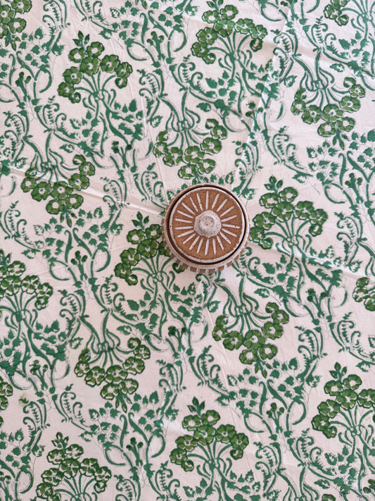 House of Mulmul - Cotton Table Cloth Round. Decorative green floral pattern on a white background with a central circular design.