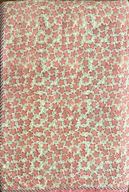 House of Mulmul - Coverlet Dohar, cotton blanket, muslin blanket, mulmul dohar. Patterned fabric with star design in pink and green