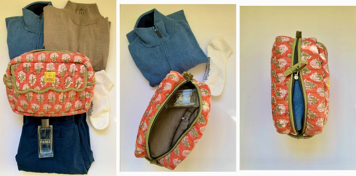 House of Mulmul - Handblock Printed Travel Makeup Quilted Pouch setA three-panel collage showing a small zippered pouch with a coral-red and green floral print, displayed with folded clothing on a white background. The left panel shows the pouch closed with jeans, a tan top, and white socks around it; the center panel shows the pouch open, revealing a blue interior and zipper; the right panel shows the pouch closed from the side.