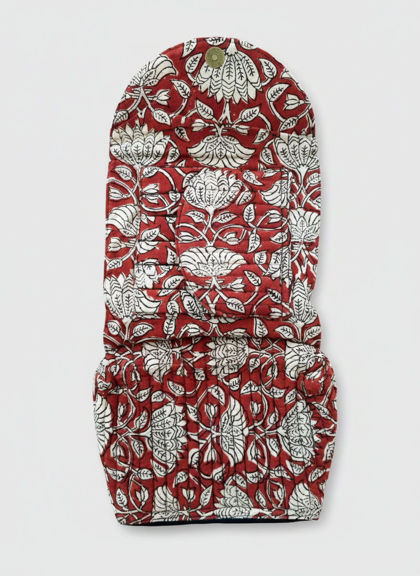 House of Mulmul - Quilted Foldable Travel Makeup pouch. Red and white floral patterned makeup bag on a light gray background