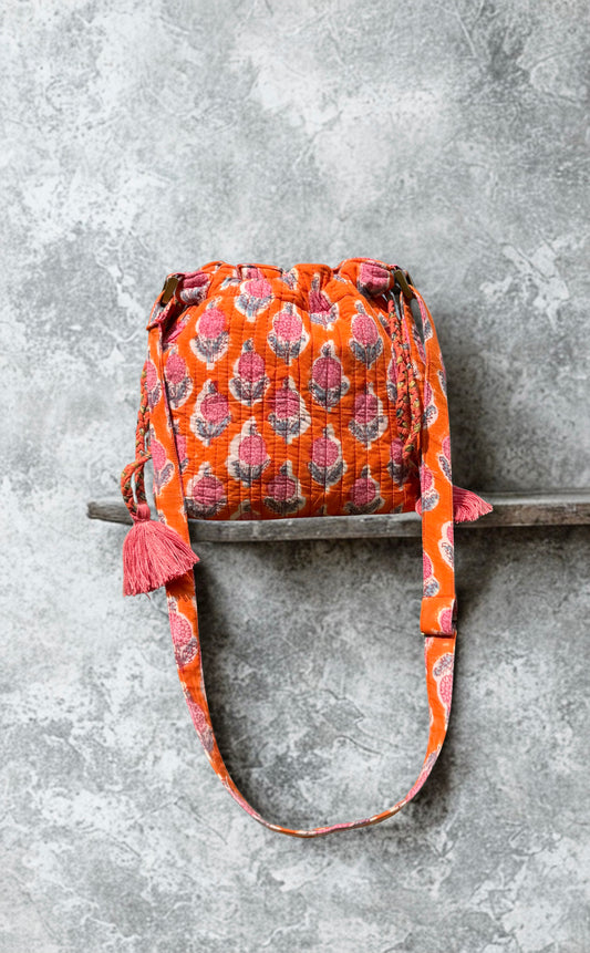 House of Mulmul - Garden Wayfarer Bucket Bag, Cotton bag, Crossbody sling bag. Decorative bag with a pattern on a gray surface