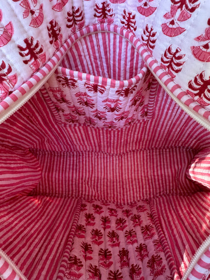 House of Mulmul - Cotton Tote Bag. Close-up of a fabric with pink red and white patterned interior