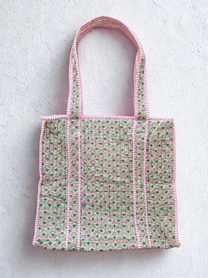 House of Mulmul - Cotton Tote Bag. Tote bag with pink and green pattern on a light gray background