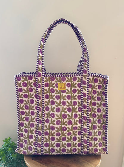 House of Mulmul - Cotton Tote Bag, Travel Bag. Floral patterned tote bag with purple flowers on a plain background